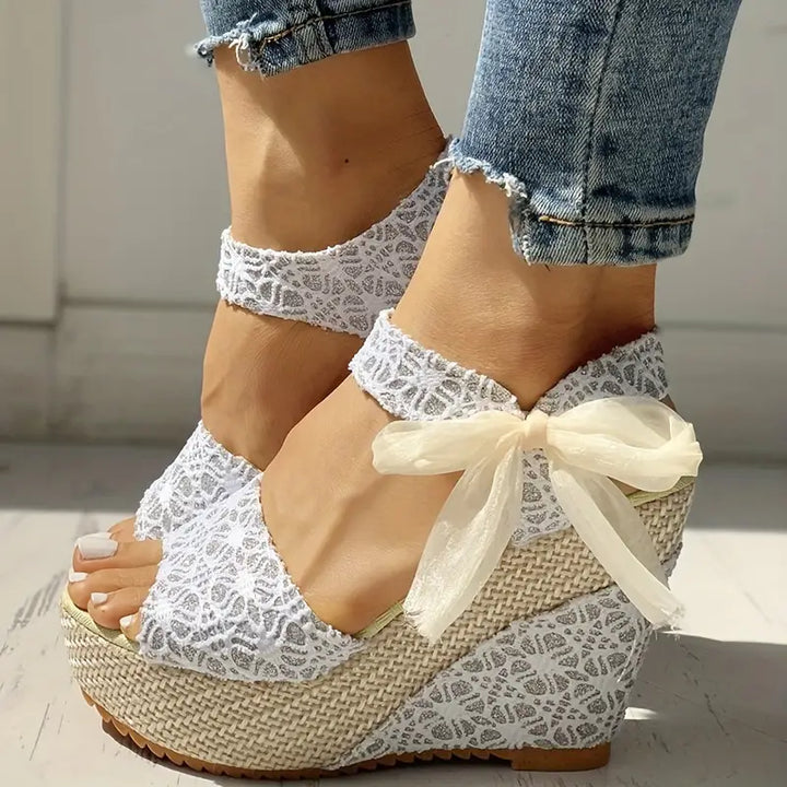 Helena - Stylish wedge heel sandals with delicate bow for the modern woman